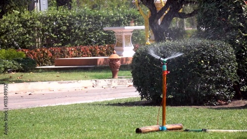Water splash on the sprinkler in Slow motion shot