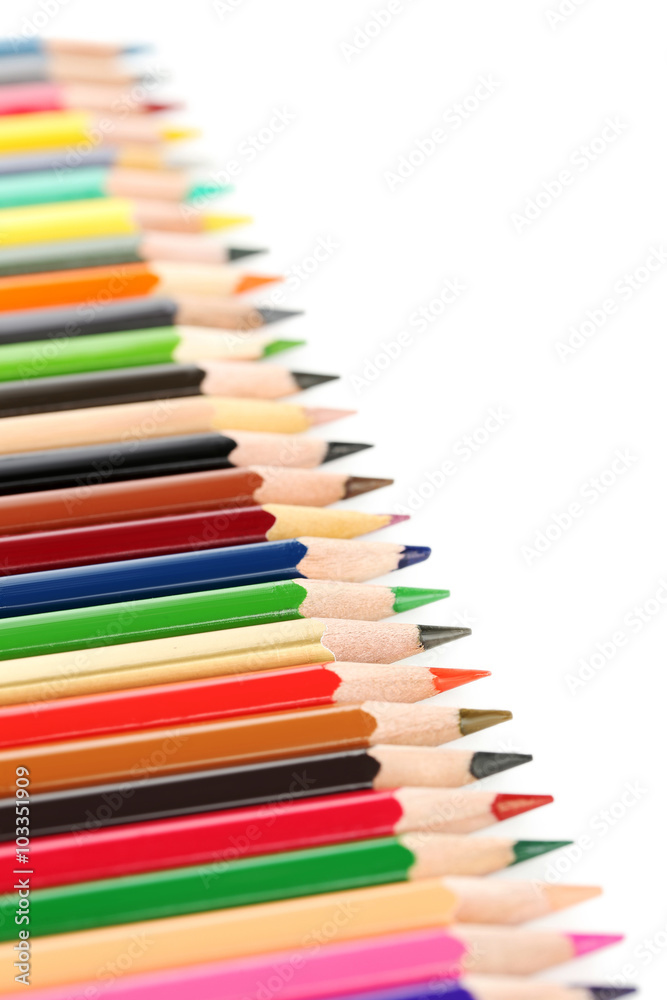 Drawing colourful pencils on a white background, close up