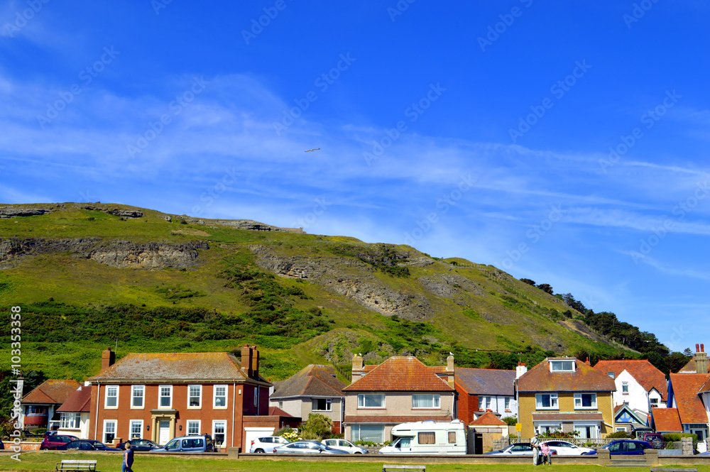 Llandudno West shore with a view of Great Orme behind the houses