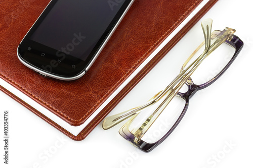 notebook glasses phone