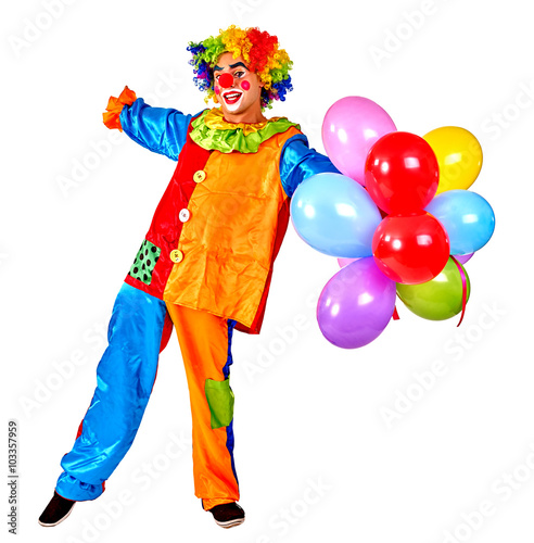 Happy birthday clown holding keeps bunch of balloons. Isolated.