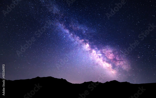 Landscape with Milky Way. Night sky with stars at mountains