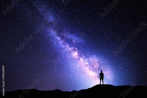 Photography Milky Way. Night sky and silhouette of a standing man