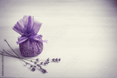 Sack of lavender. Fragrant bag of lavender flowers. Sprigs of lavender near the bag with Lavender. selective focus.Vintage effect