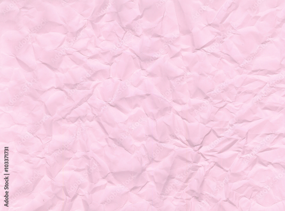 Texture of crumpled pink paper.