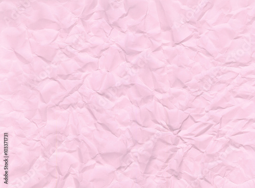 Texture of crumpled pink paper.