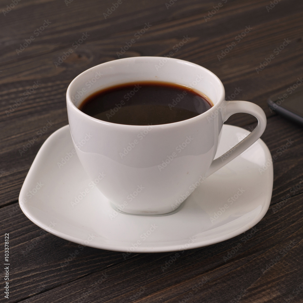 Coffee American with a smartphone Coffee American with a smartphone