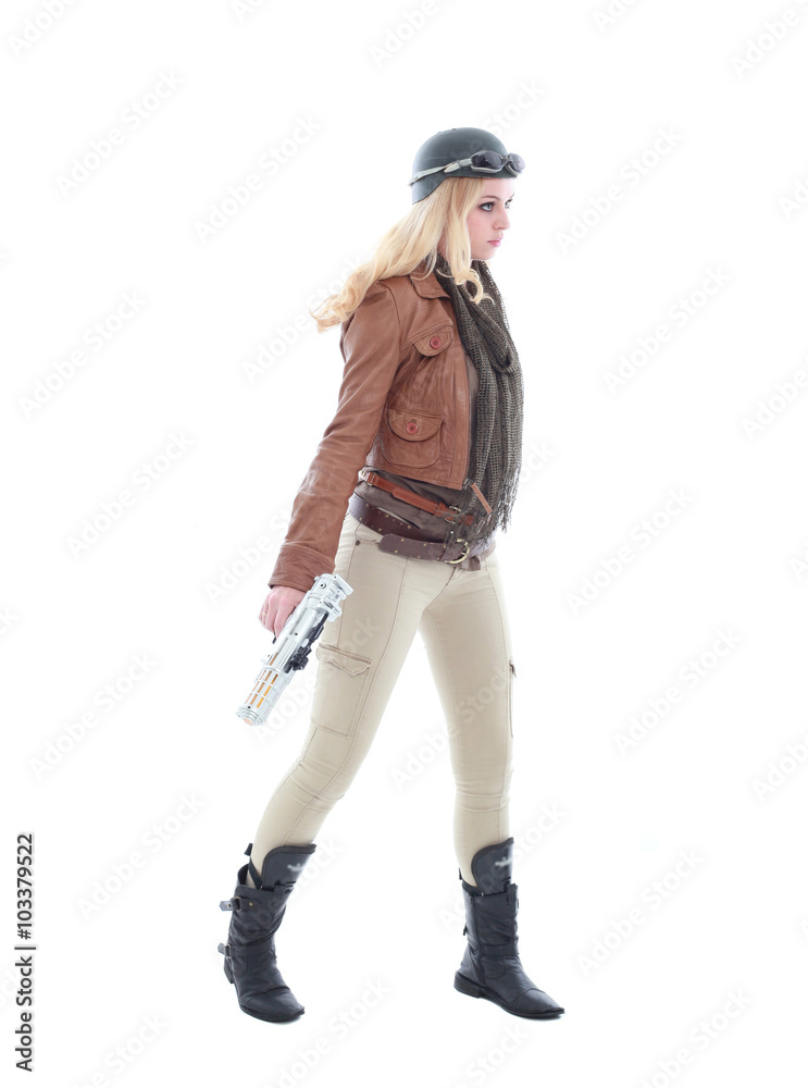 young blonde woman in a steampunk outfit, action hero pose. isolated on white background. young blonde woman in a steampunk outfit, action hero pose. isolated on white background.