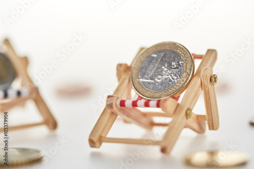 Pension concept shot with money on lounger