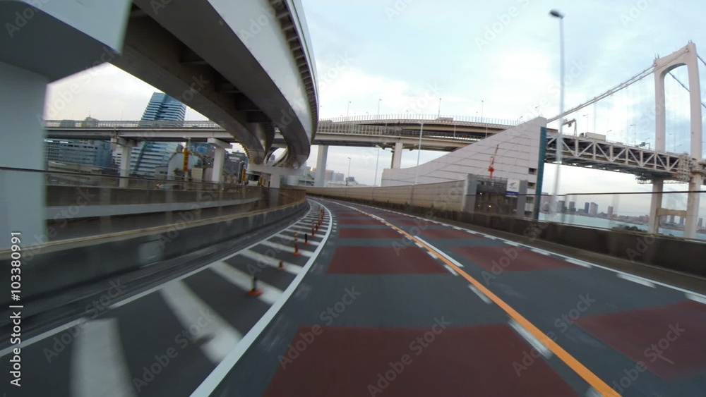 Rear view variation from a running car over the Tokyo Rainbow Bridge. Rear view variation from a running car over the Tokyo Rainbow Bridge.