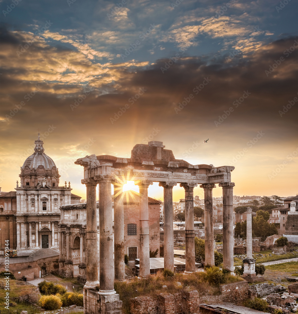 Famous Roman ruins against sunrise in Rome, Italy