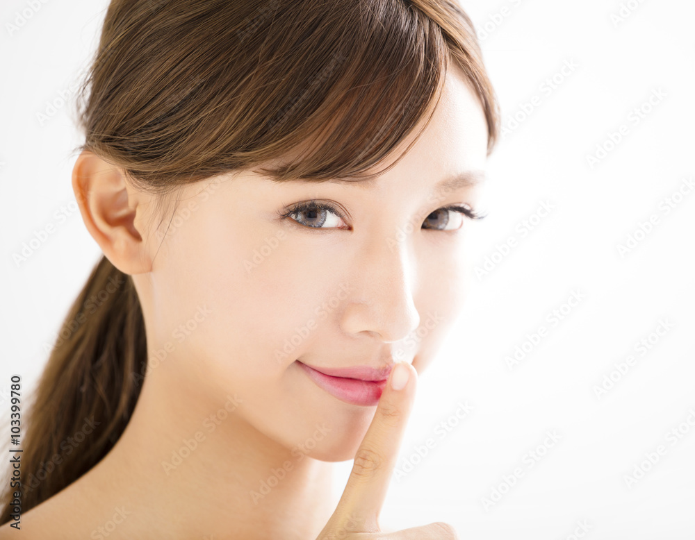 closeup beautiful young woman face closeup beautiful young woman face