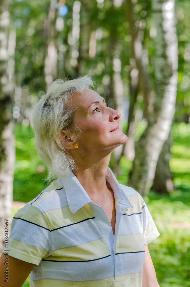 Portrait of the woman in a birch wood Portrait of the woman in a birch wood