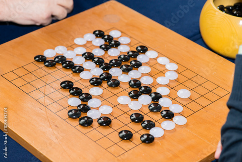 Traditional chinese boardgame Go. Selected focus photo