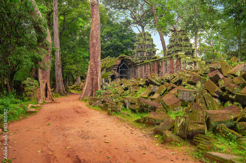 Ta Prohm  part of ancient  Khmer temple complex in jungle.