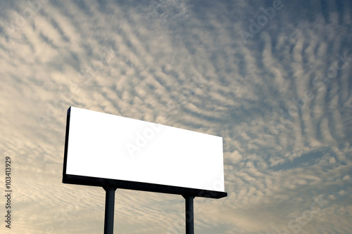 blank billboard against sunset sky