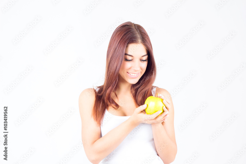 Happy smilling woman looking at apple. Healthy lifestyle. Happy smilling woman looking at apple. Healthy lifestyle.