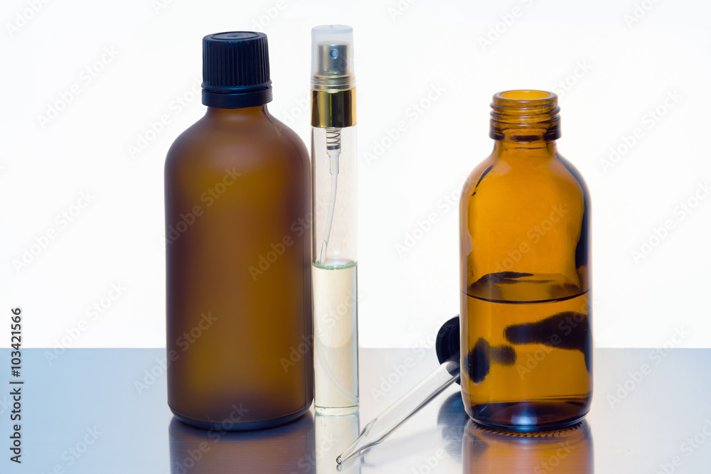 Cosmetic and fragrance glass bottle in white background Cosmetic and fragrance glass bottle in white background
