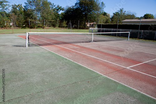 white lines on clay tennis court outdoor shot © OceanProd