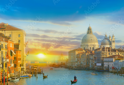 Vibrant sunrise in Venice city among historic architecture illuminated by sunshine © cristianbalate