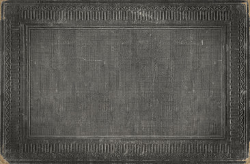 
Grey vintage background from distress fabric texture with antique ornamental frame