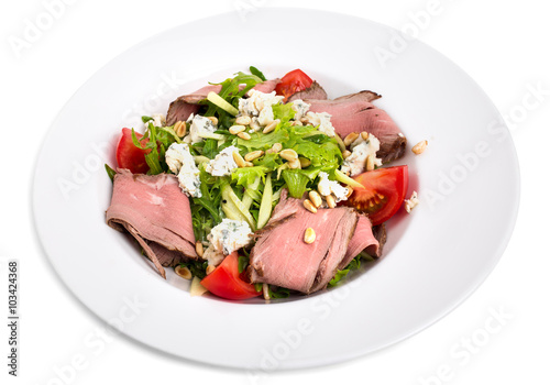 Warm roast beef salad with goat cheese.