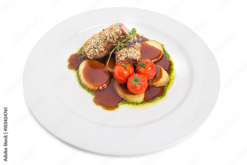 Breaded pork fillet with tomatoes confit. Breaded pork fillet with tomatoes confit.