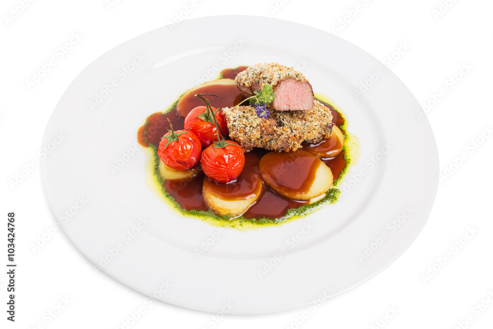 Breaded pork fillet with tomatoes confit.