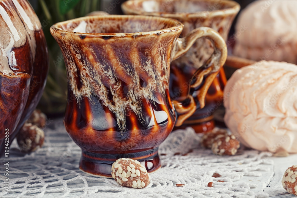 coffee cups with a zephyr, candies and snowdrops coffee cups with a zephyr, candies and snowdrops