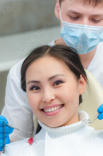 Young female patient at dentist office