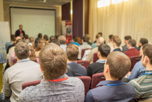 Meeting in a conference hall.