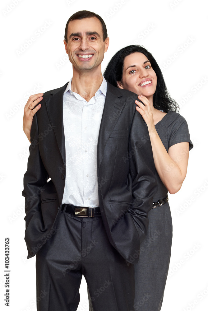 Couple embrace, studio portrait on white. Dressed in black suit. Couple embrace, studio portrait on white. Dressed in black suit.
