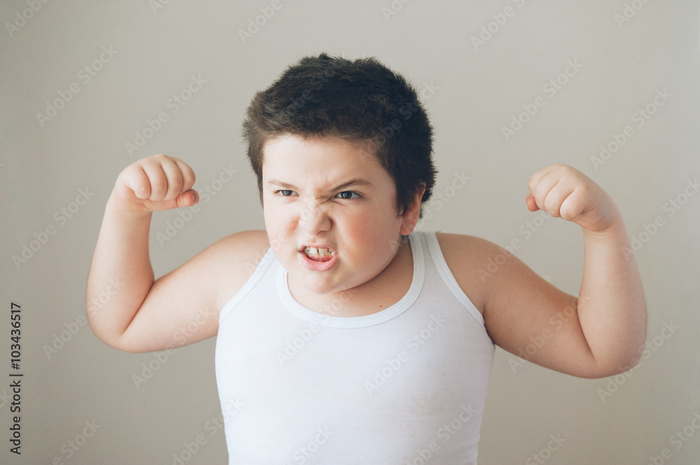 child kid showing muscles exercise teeth child kid showing muscles exercise teeth