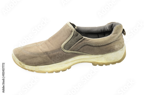 Used brown canvas casual shoes on a white background