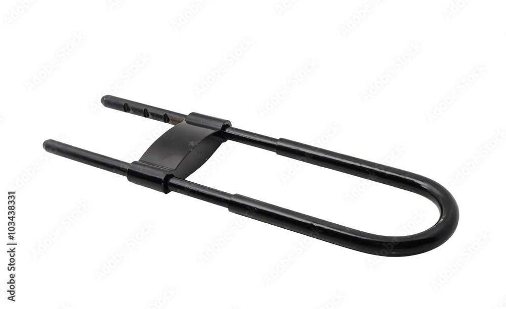 Used black and rusty motorcycle security device on white background Used black and rusty motorcycle security device on white background
