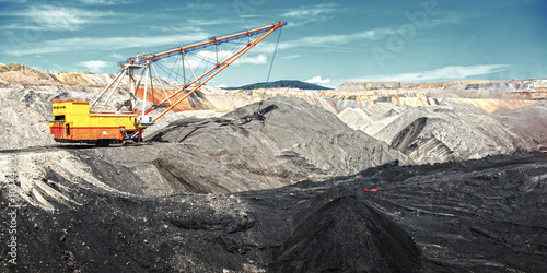 Dragline on open pit coal mine photo