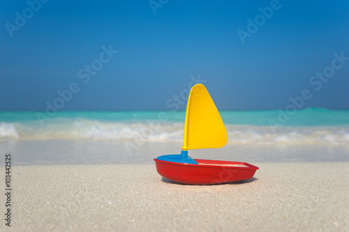 Canvas Print toy ship on the sea background
