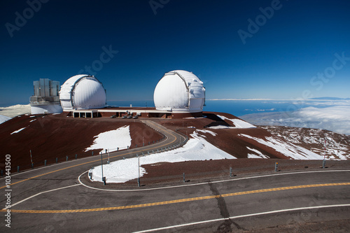 Observatory domes at the peak of Mauna Kea volcano photo