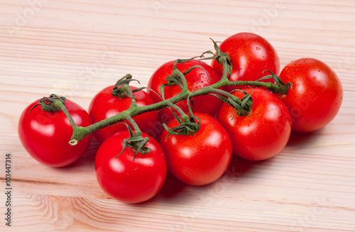cherry tomatoes on a wooden board