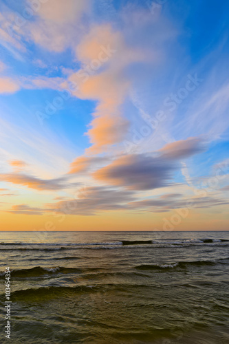 Stunning stratus cloud formations at sunset over the Baltic sea. Gdansk Bay, Pomerania, northern Poland.