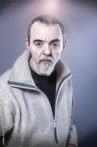 Fotografie Portrait of a man made-up as devil