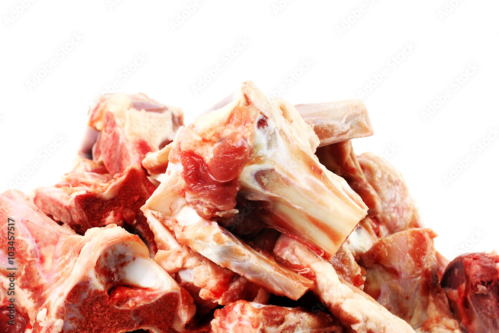 Fresh red meat and bones on white