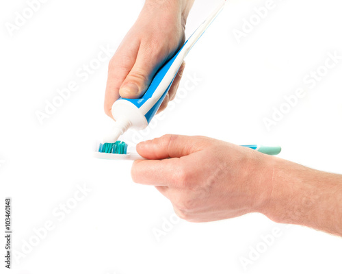 Toothbrush with toothpaste in the hand