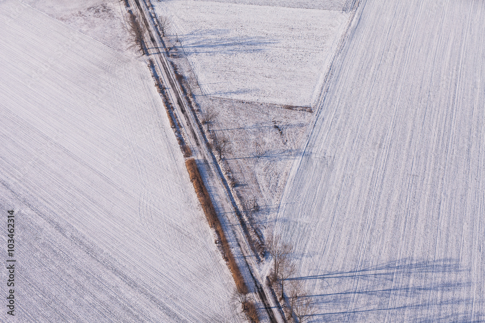 aerial view  over the harvest fields in winter