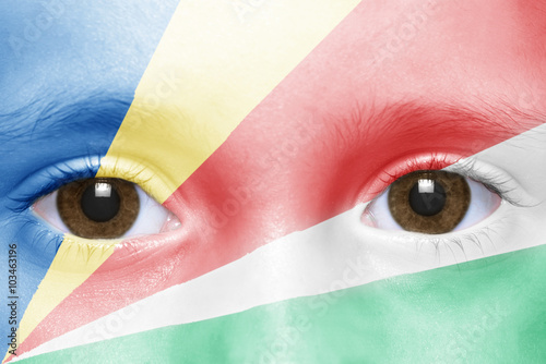 human's face with seychelles flag