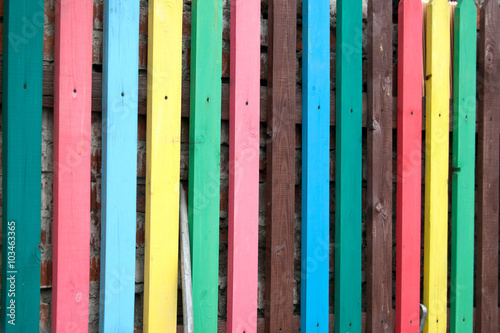 Fence multicolored wooden. Background