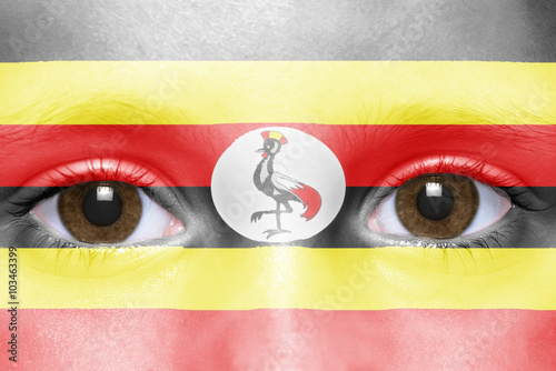 human's face with ugandan flag