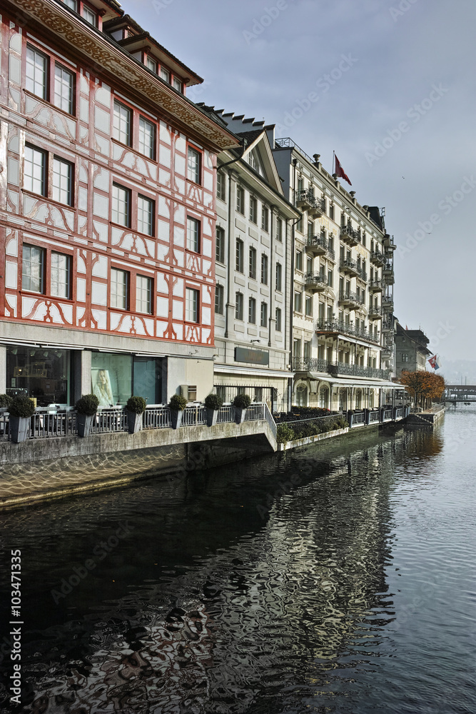 Naklejka premium houses in old town and The Reuss River in City of Luzern, Switzerland