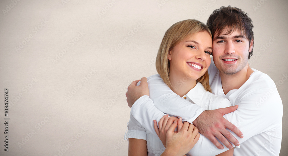 Young smiling couple.