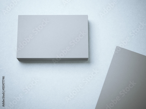 Stack of gray blank business cards © ekostsov